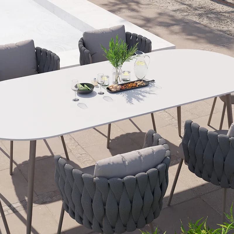 7 Pieces Outdoor Dining Set with Oval Faux Marble Top Table and Rope Woven Armchair