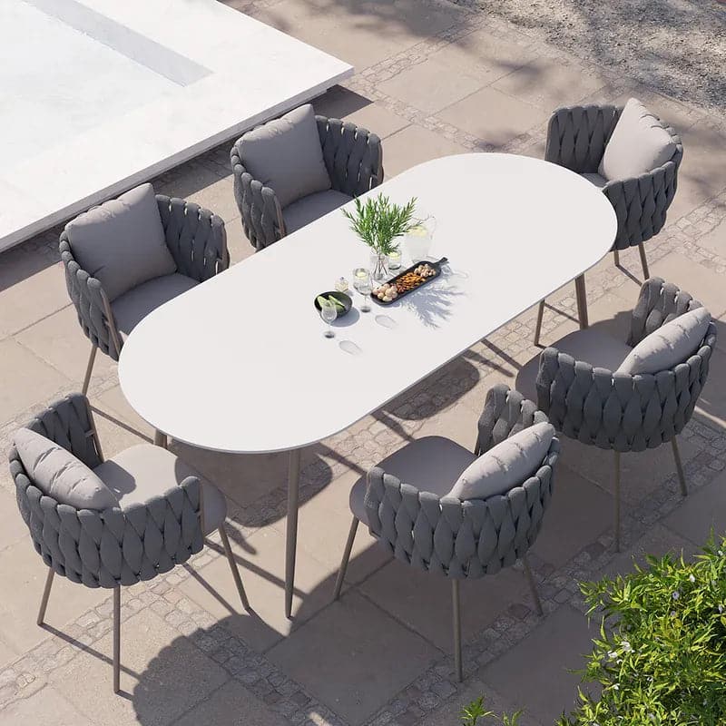 7 Pieces Outdoor Dining Set with Oval Faux Marble Top Table and Rope Woven Armchair